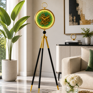 Decorative floor lamp with a gold and black design in a living room setting.