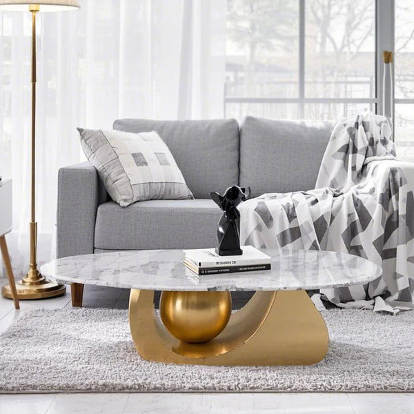 Designer Oval Coffee Table 47" White Faux Marble Top, Golden Metal Ball Base, Centerpiece